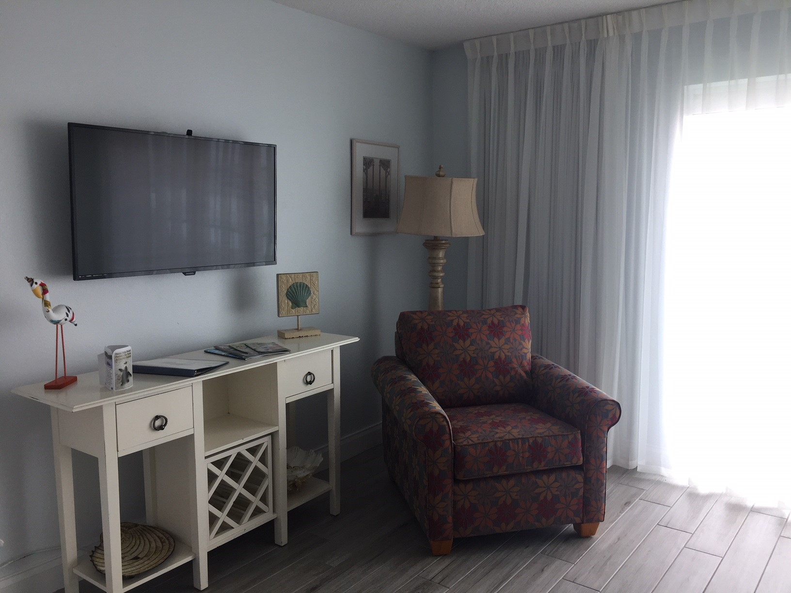 TV in living room and bedroom of 1-bedroom suite